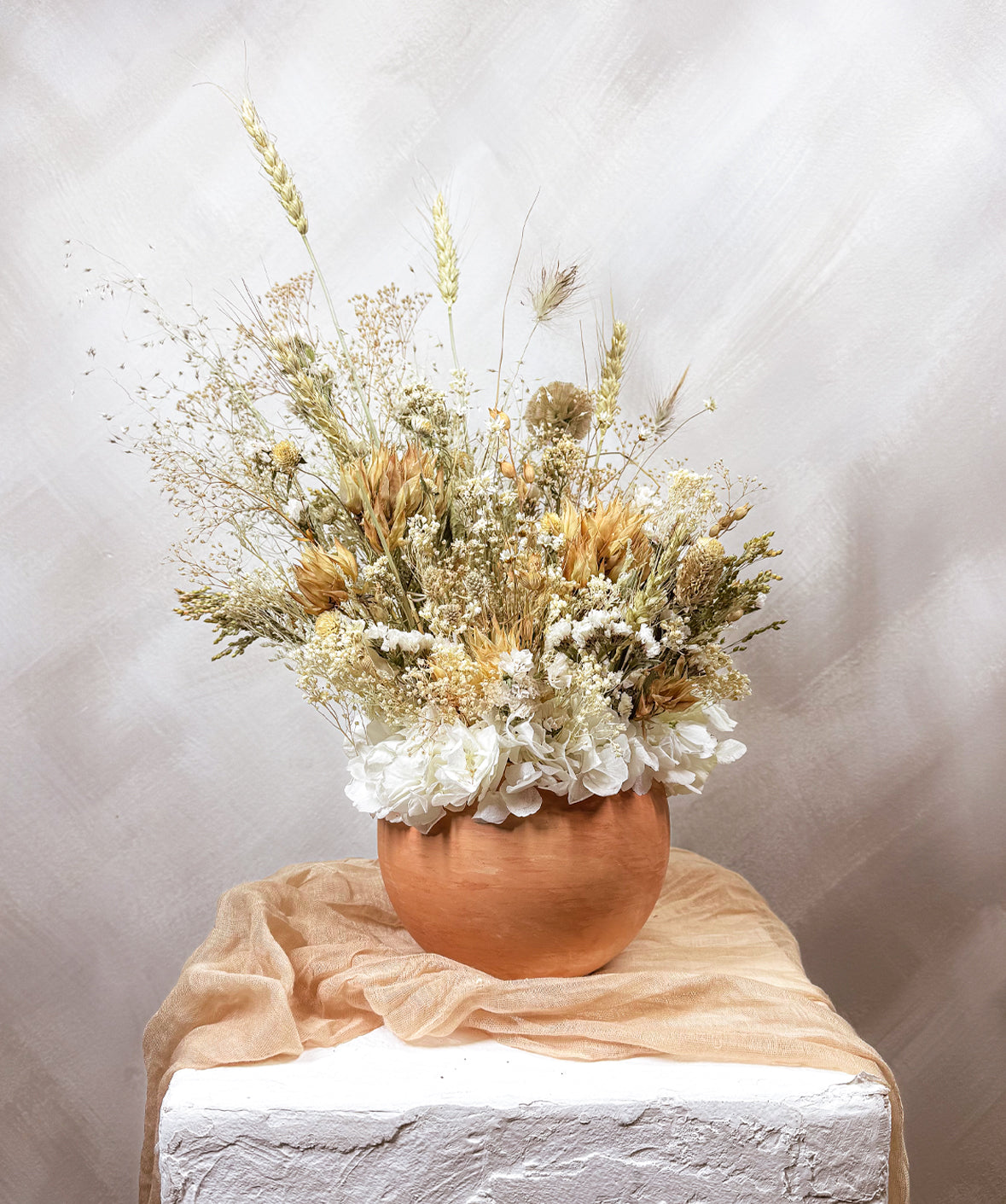 A LOTTA TERRA COTTA ARRANGEMENT